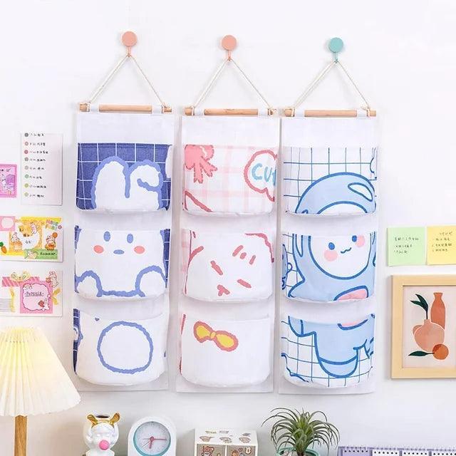 3 Pocket Hanging Storage Bag with Wooden Rod for Wall or Door Organisation - Astronaut